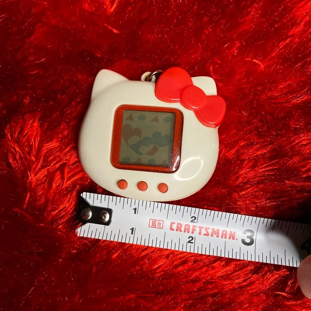 1997 vintage hello Kitty tamagotchi